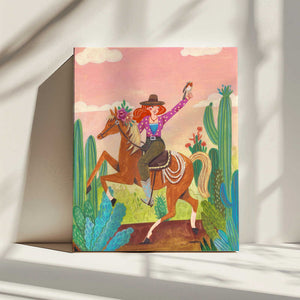 Tablou canvas „Cowgirl on horse in the desert” de Caroline Bonne Müller