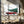 Tablou canvas „Eighties car carrying a Christmas tree” de Rosana Laiz Blursbyai