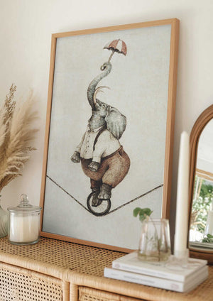 Tablou înramat „ Unicycle While Holding An Umbrella” de Mike Koubou
